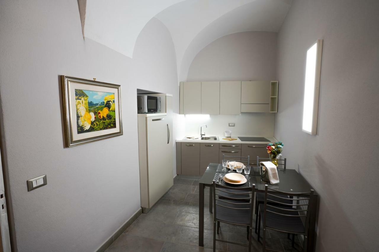 Residenze Deriu "Exclusive Apartments" 博萨 外观 照片